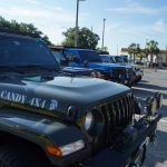 Jeep convoy lined up at Turkey Lake Plaza before off-road event